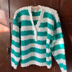 ￼ Green and white wide striped sweater.